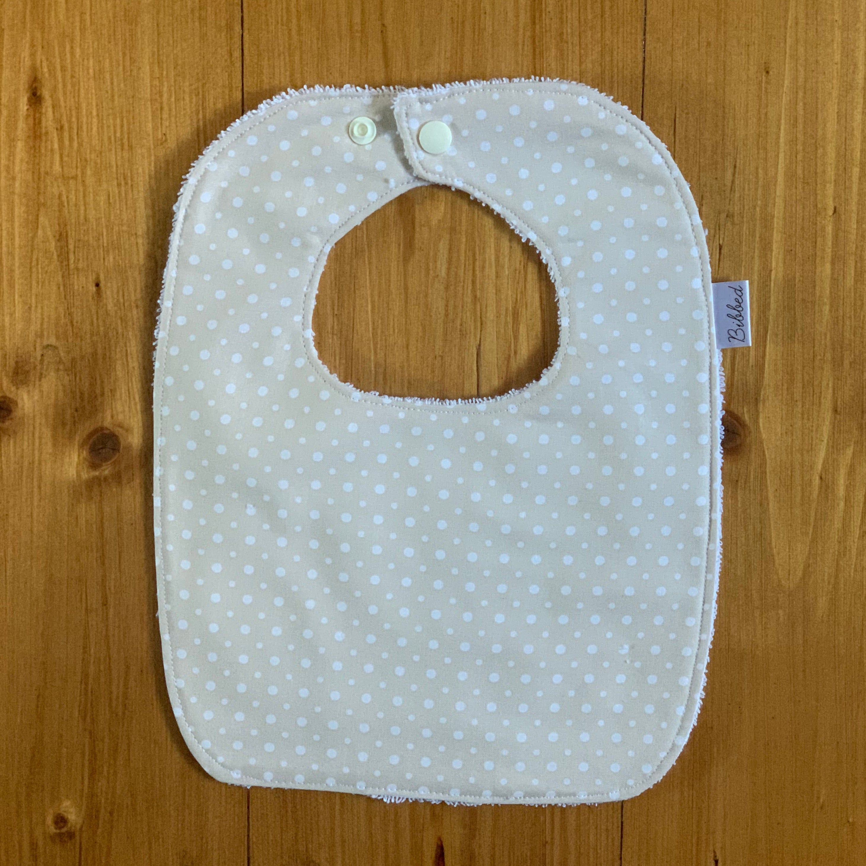 Cream Dots Dinner Bib